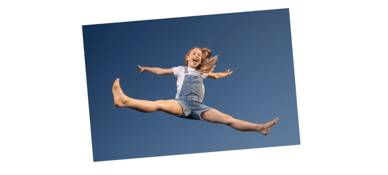 Photo of girl jumping in air.