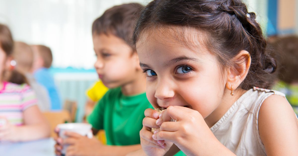 Girl eating an after school snack