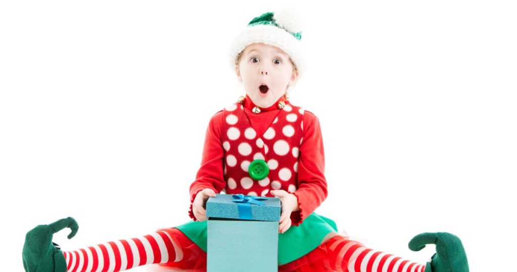 Kid opening gift for Holiday.