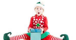 Kid opening gift for Holiday.