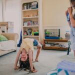 Gymnast practicing a bridge at home