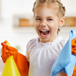 Young girl cleaning.